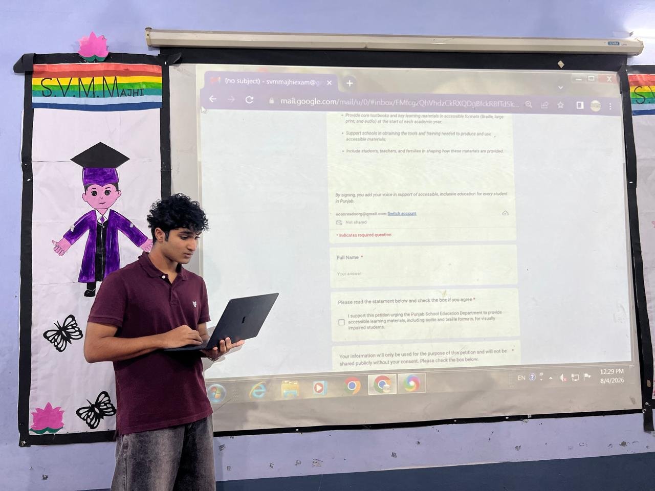 A closer view of presenting the petition sign-up form to the class